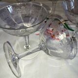 Beautiful set of seven crystal champagne glasses engraved with vine branches