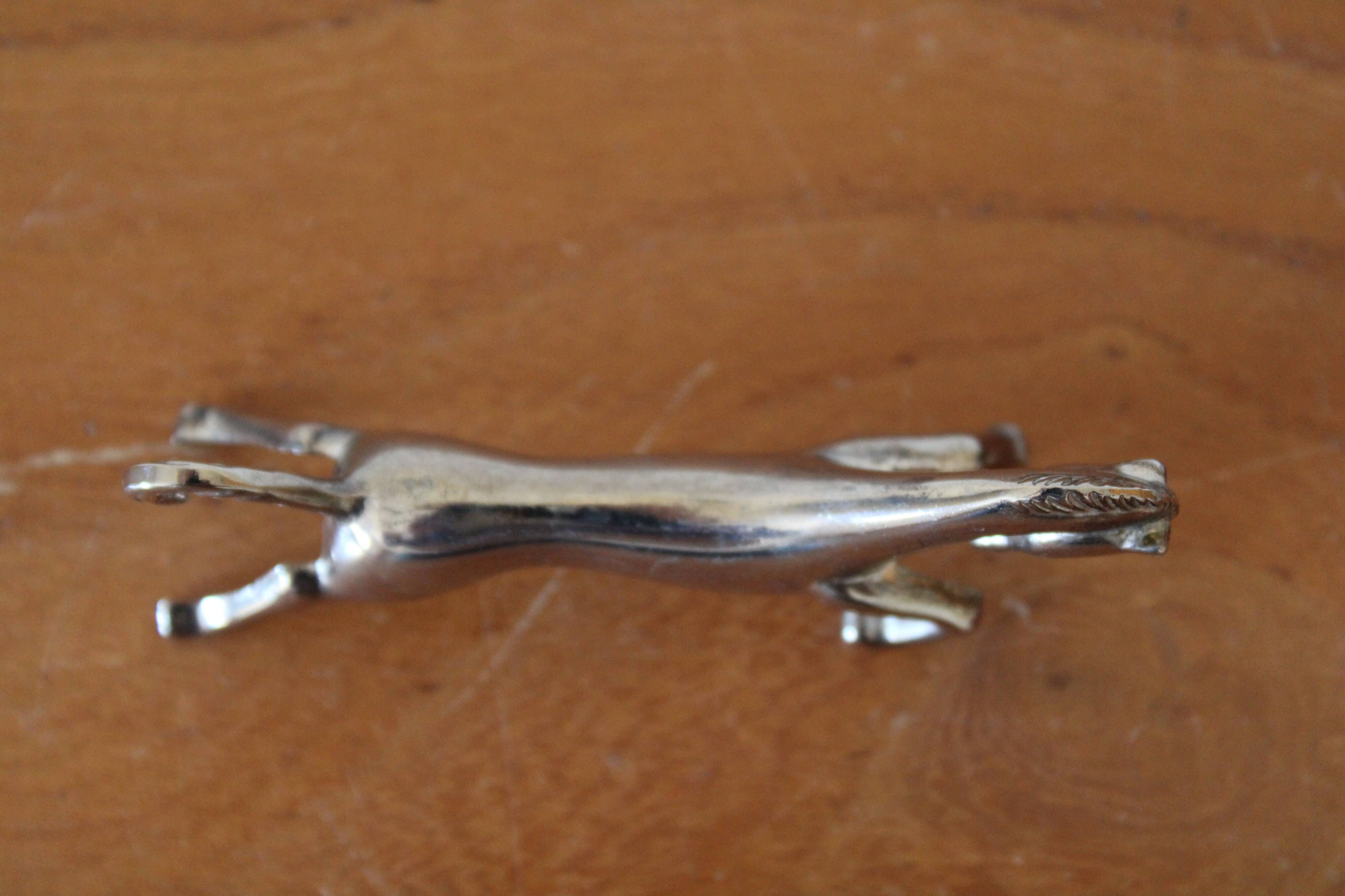 Set of 12 vintage knife rests, in silver metal