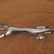 Set of 12 vintage knife rests, in silver metal