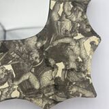 Free-form mirror decorated with cherubs