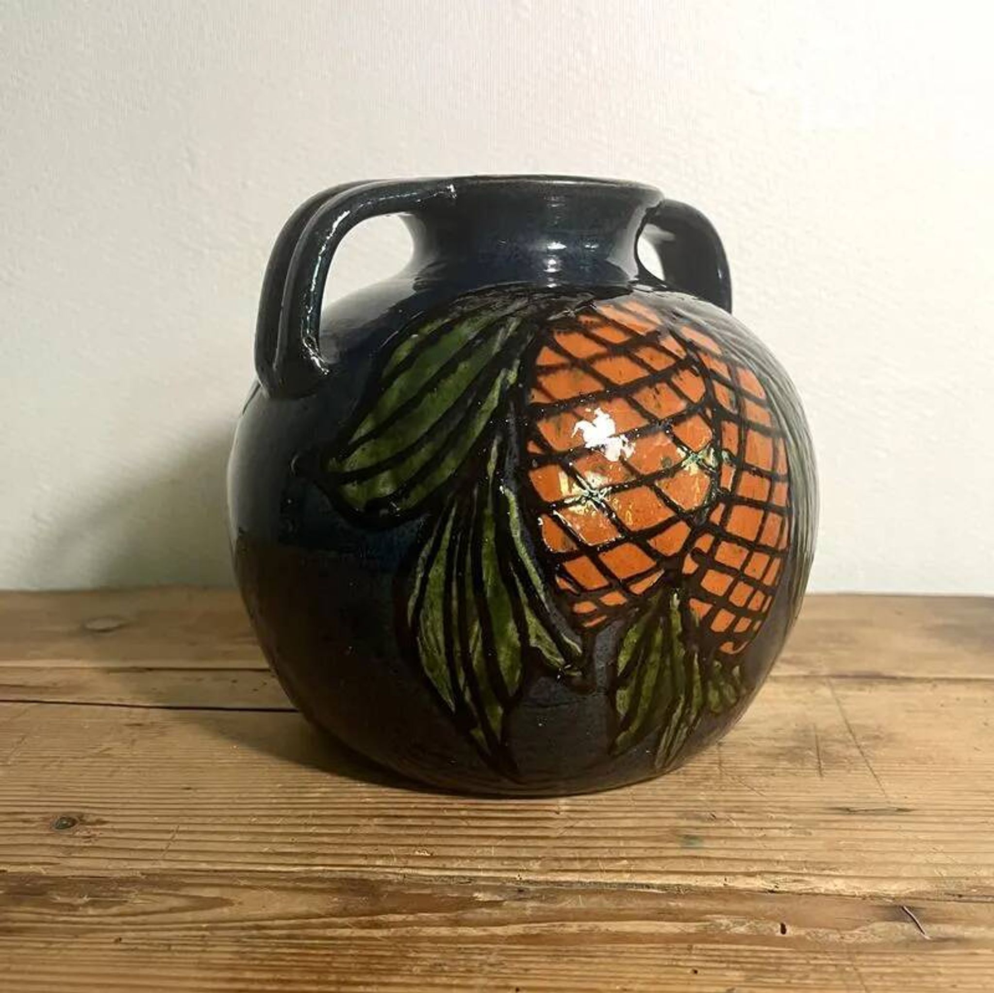 Glazed terracotta round vase