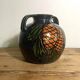 Glazed terracotta round vase