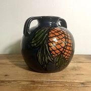 Glazed terracotta round vase