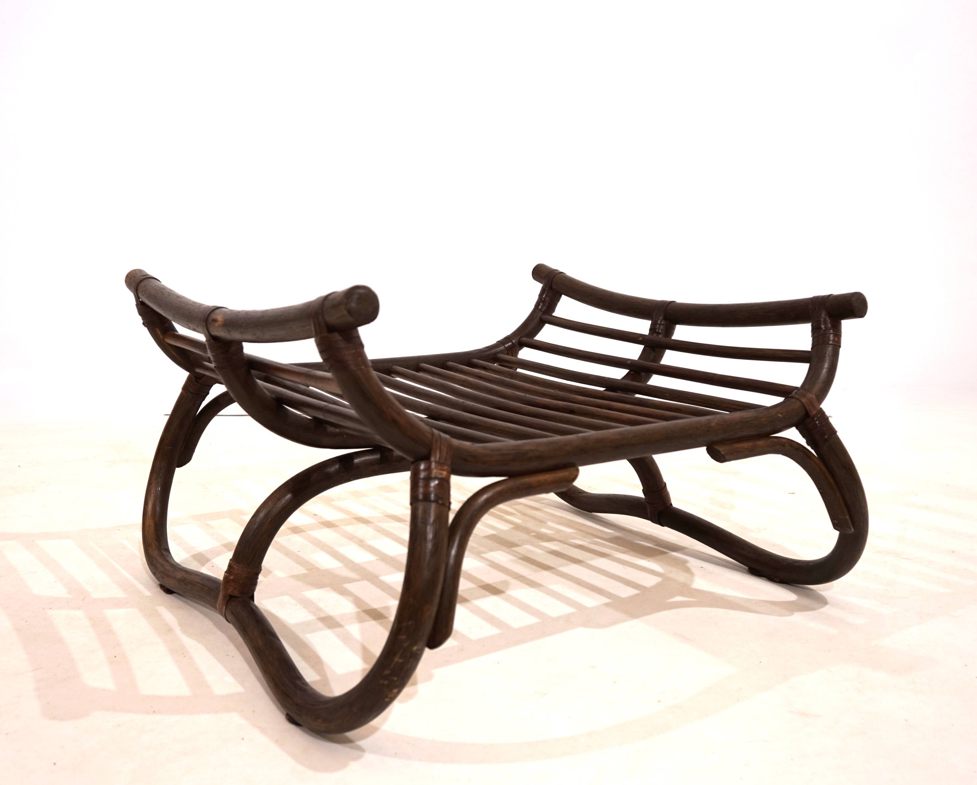 Manou rattan lounge chair in pagoda style with ottoman