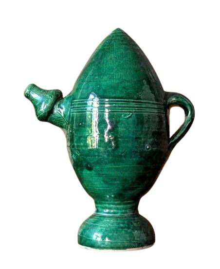Decorative piece in green glazed stoneware, jug shape.