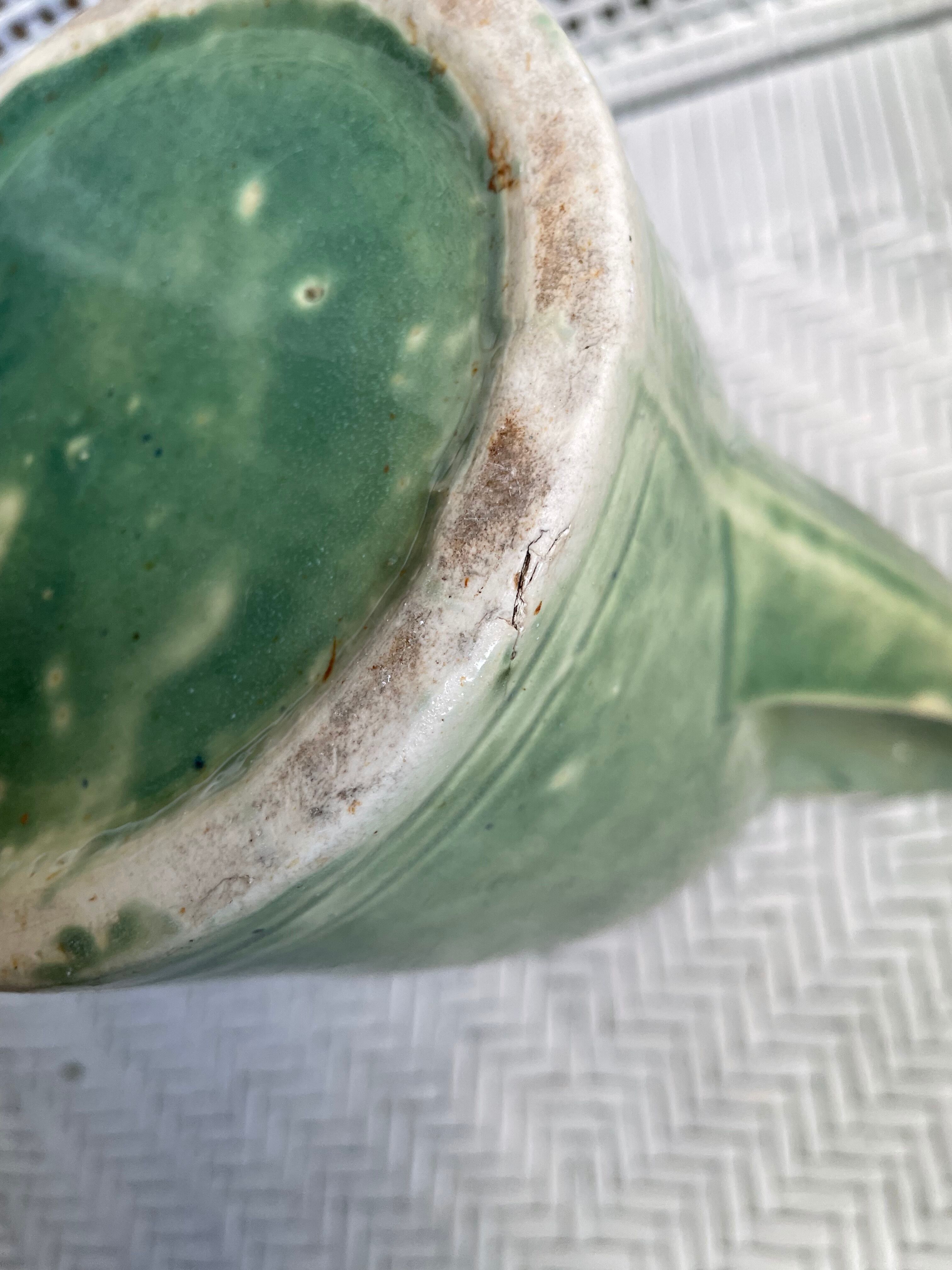 Turquoise green enamelled ceramic pitcher