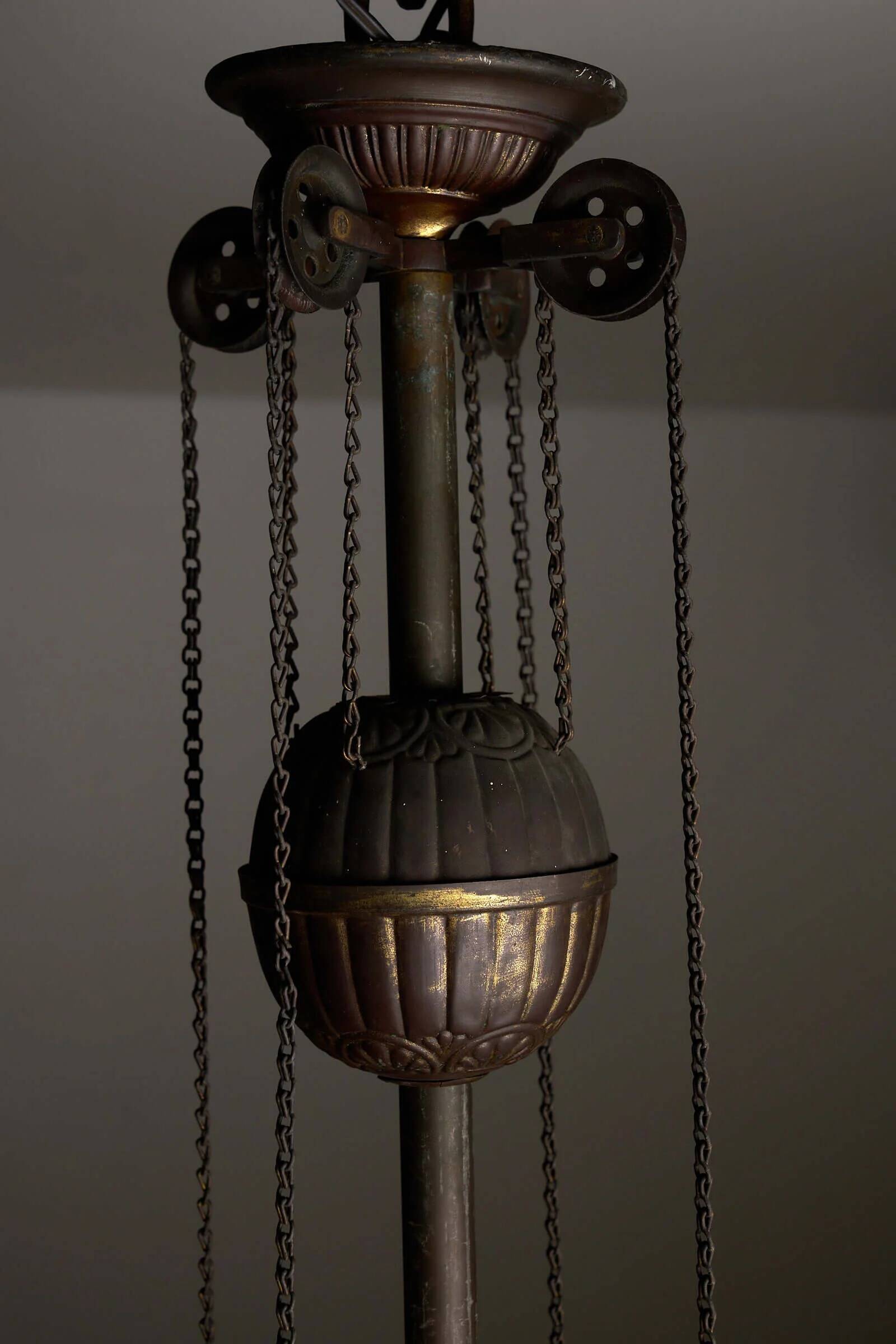 Antique adjustable height chandelier with original glasswork and brass detailing
