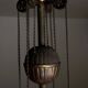 Antique adjustable height chandelier with original glasswork and brass detailing