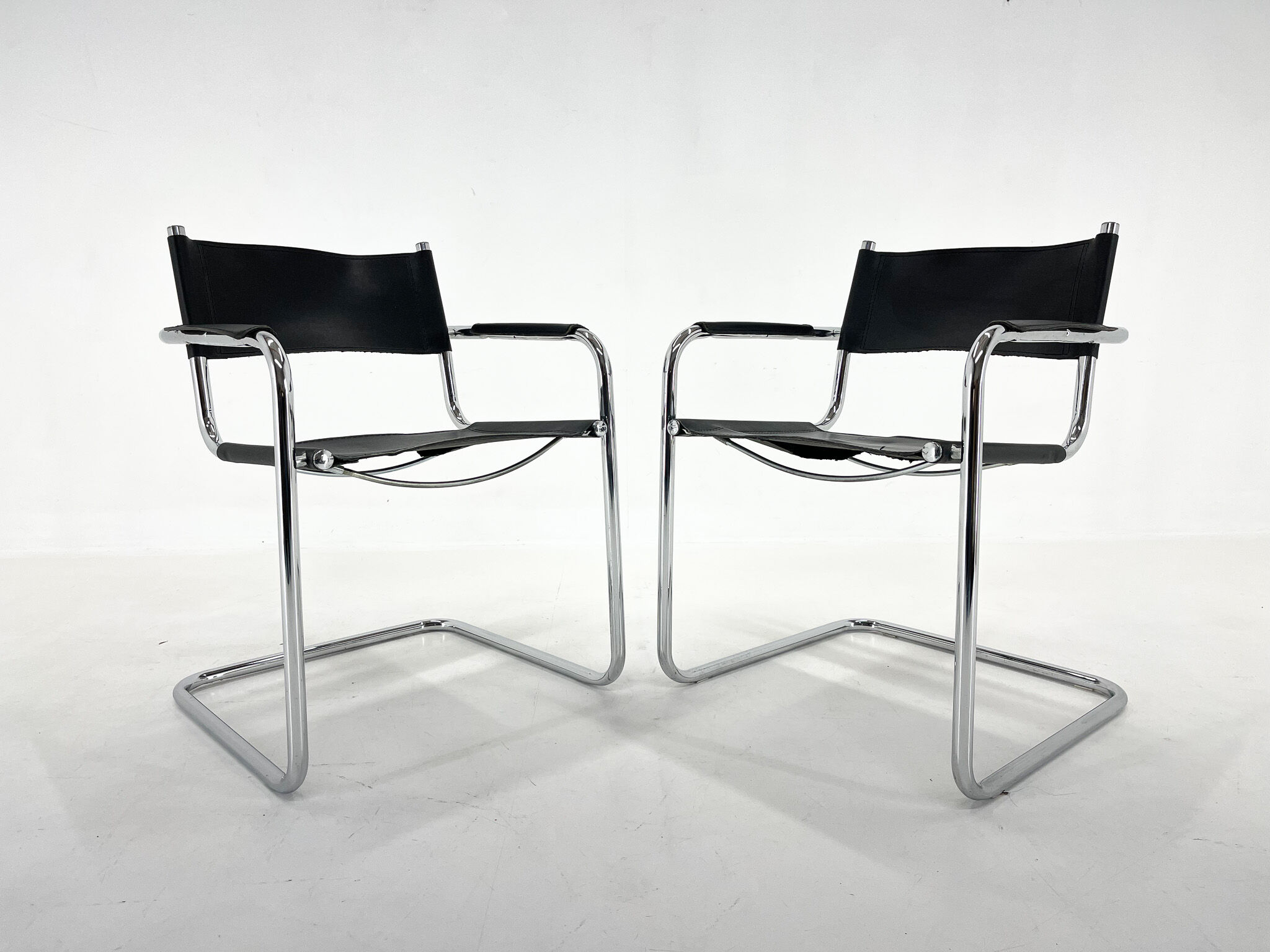 Set of two cantilever chairs, italy