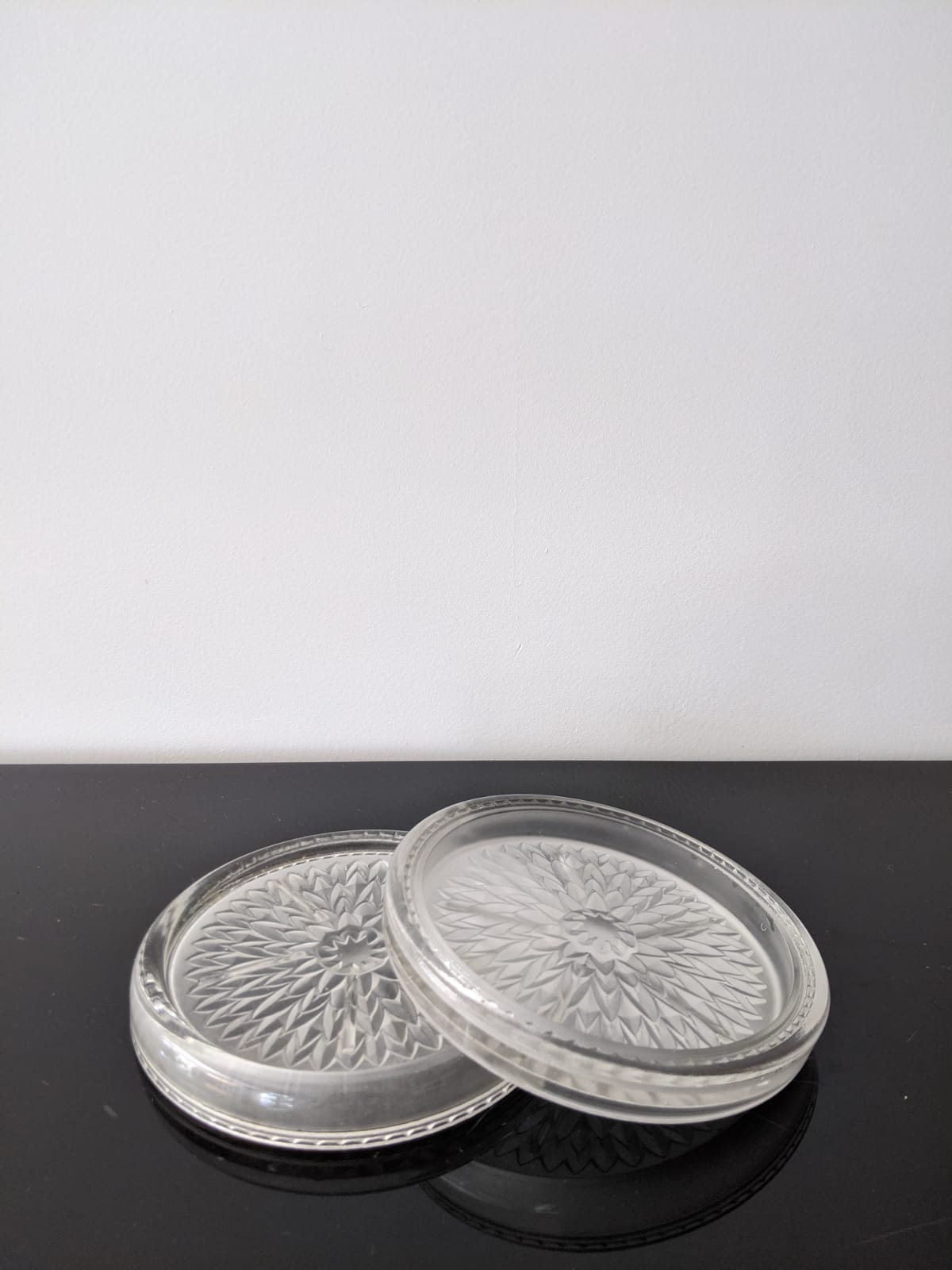 Under the plate and engraved glass bottle bottoms