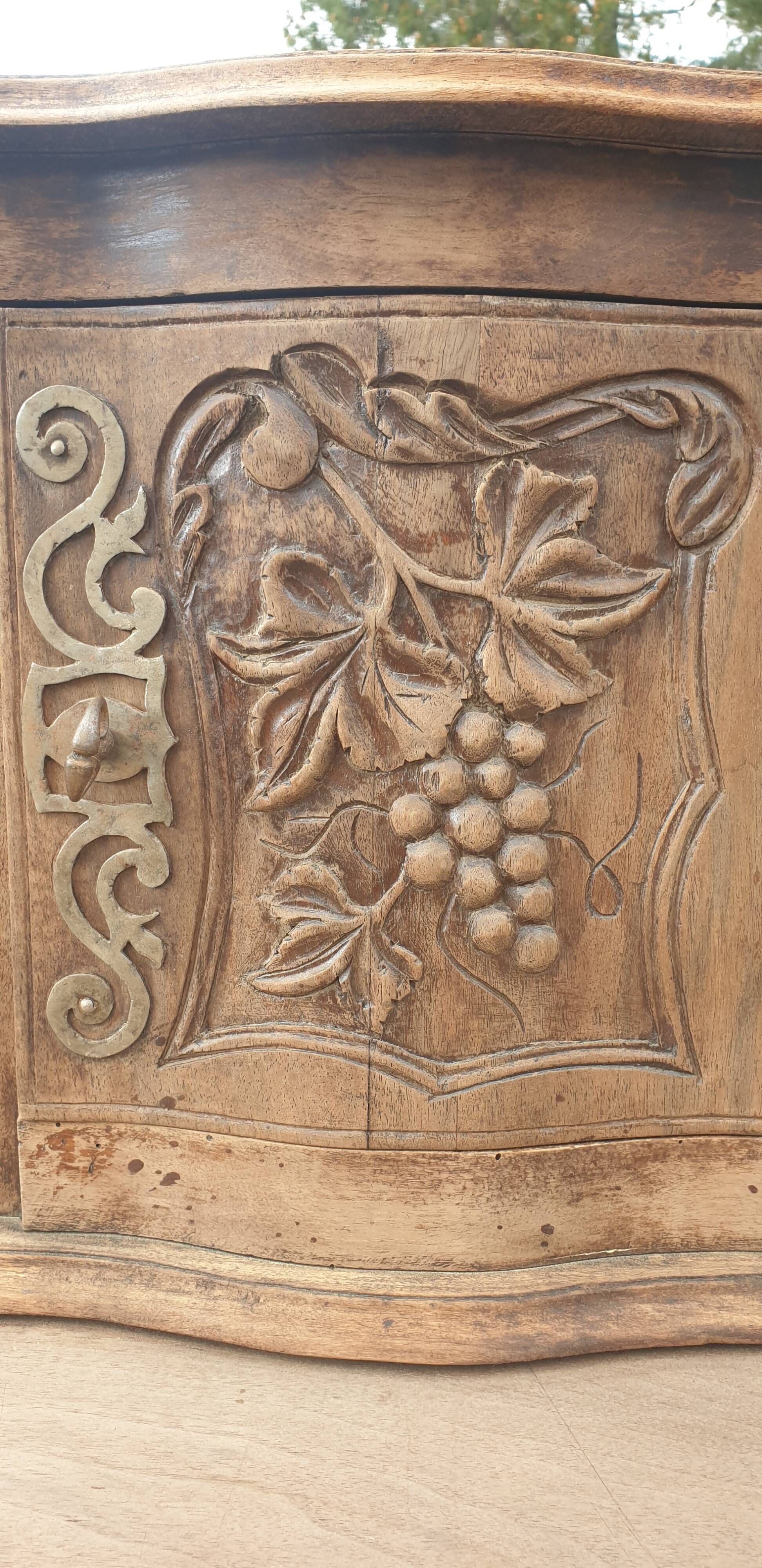 Provencal furniture in finely carved light walnut with wrought ironwork