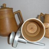 Old coffee maker and sandstone pitcher
