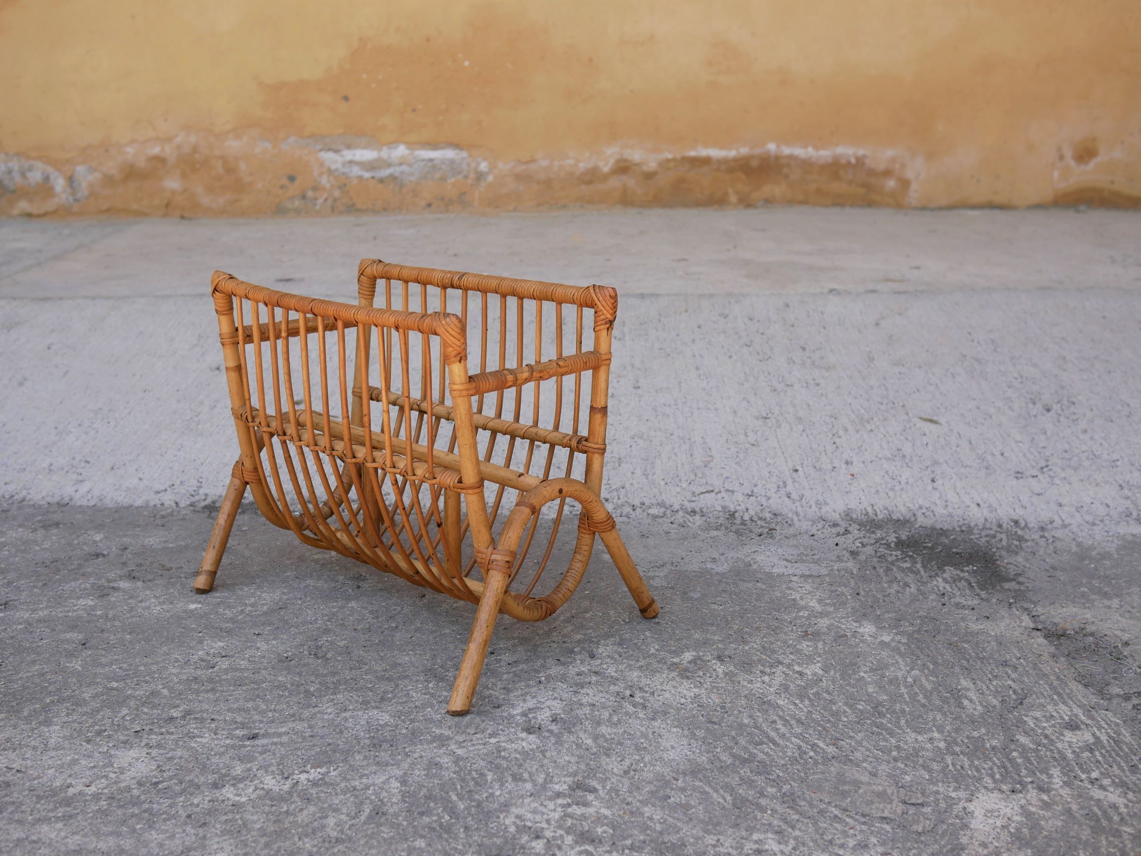 Vintage rattan magazine rack