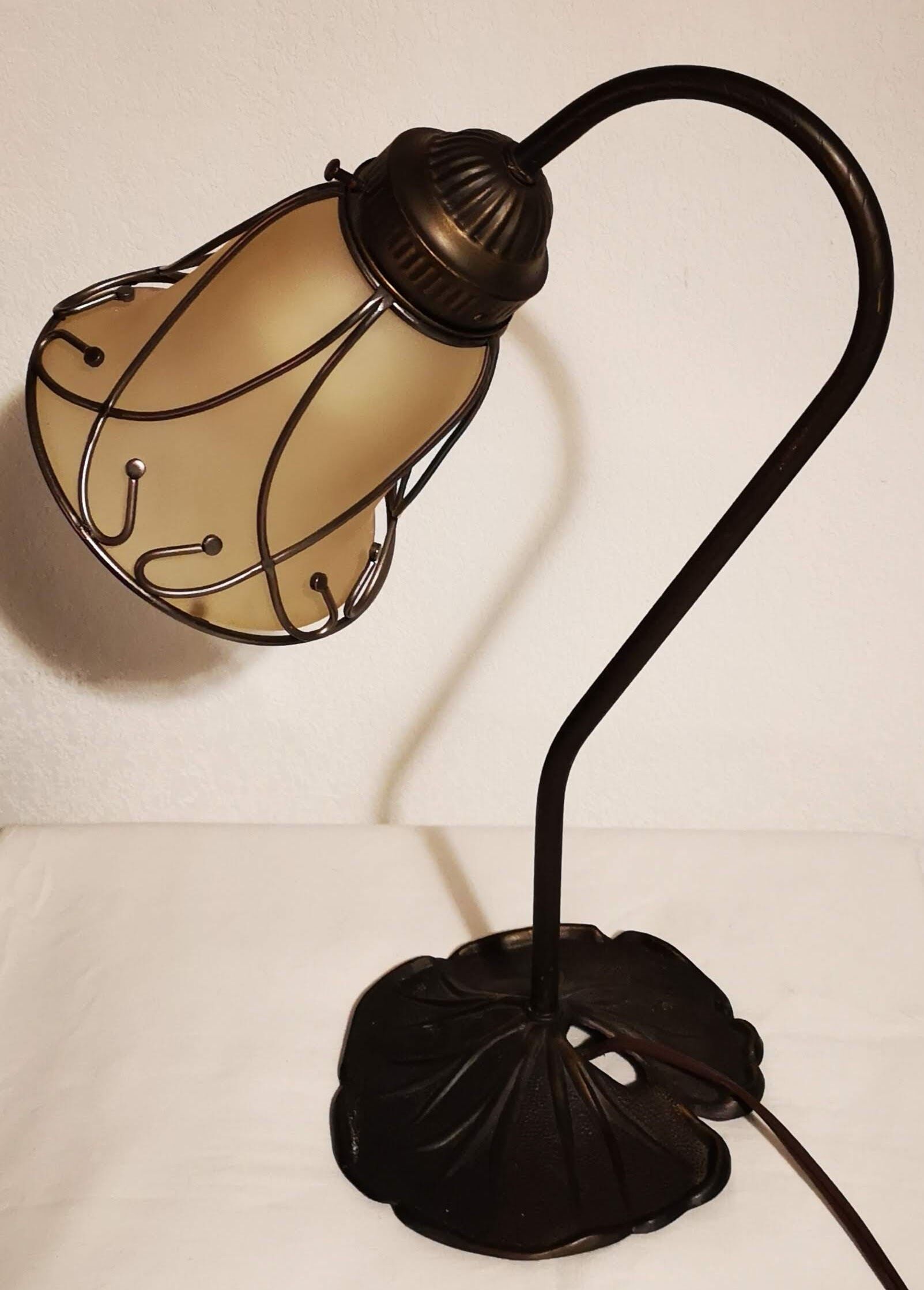 Aged metal and tulip glass