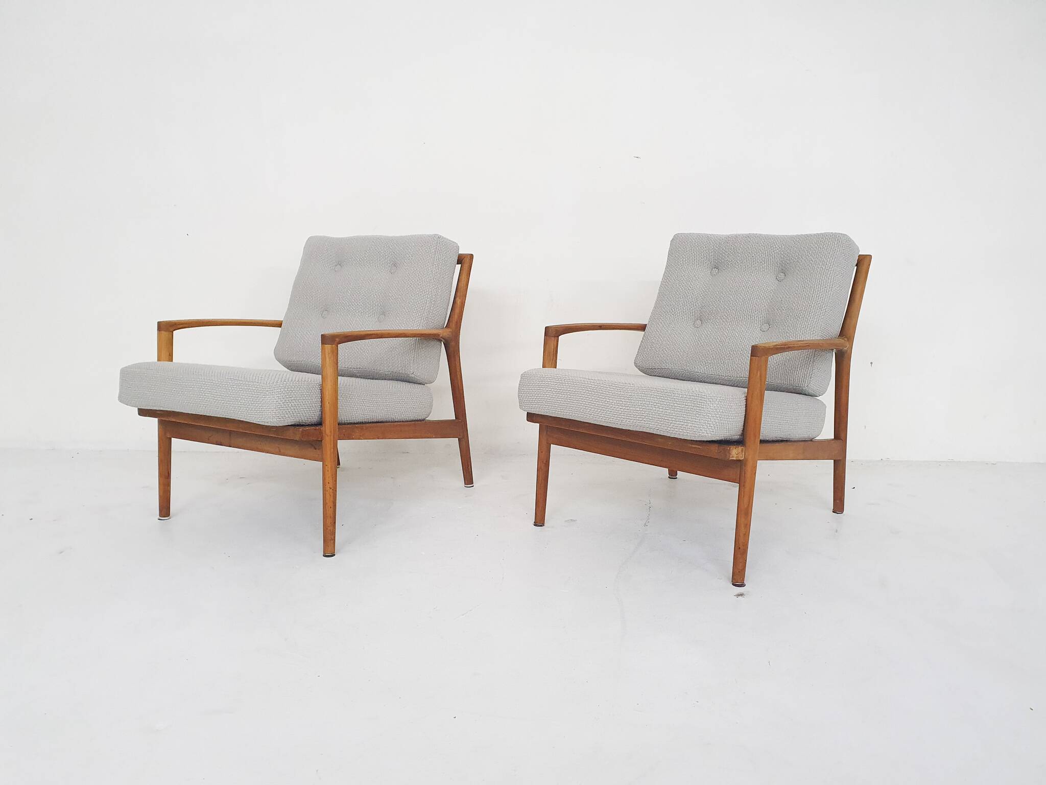 Solid oak antique dining chairs, with hand carved back rests. The chairs have no screws only wooden