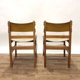 Pair of Maison Regain leather chairs