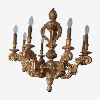 Large chandelier in gilded wood. Eight lights