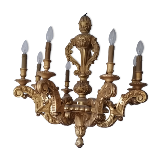 Large chandelier in gilded wood. Eight lights