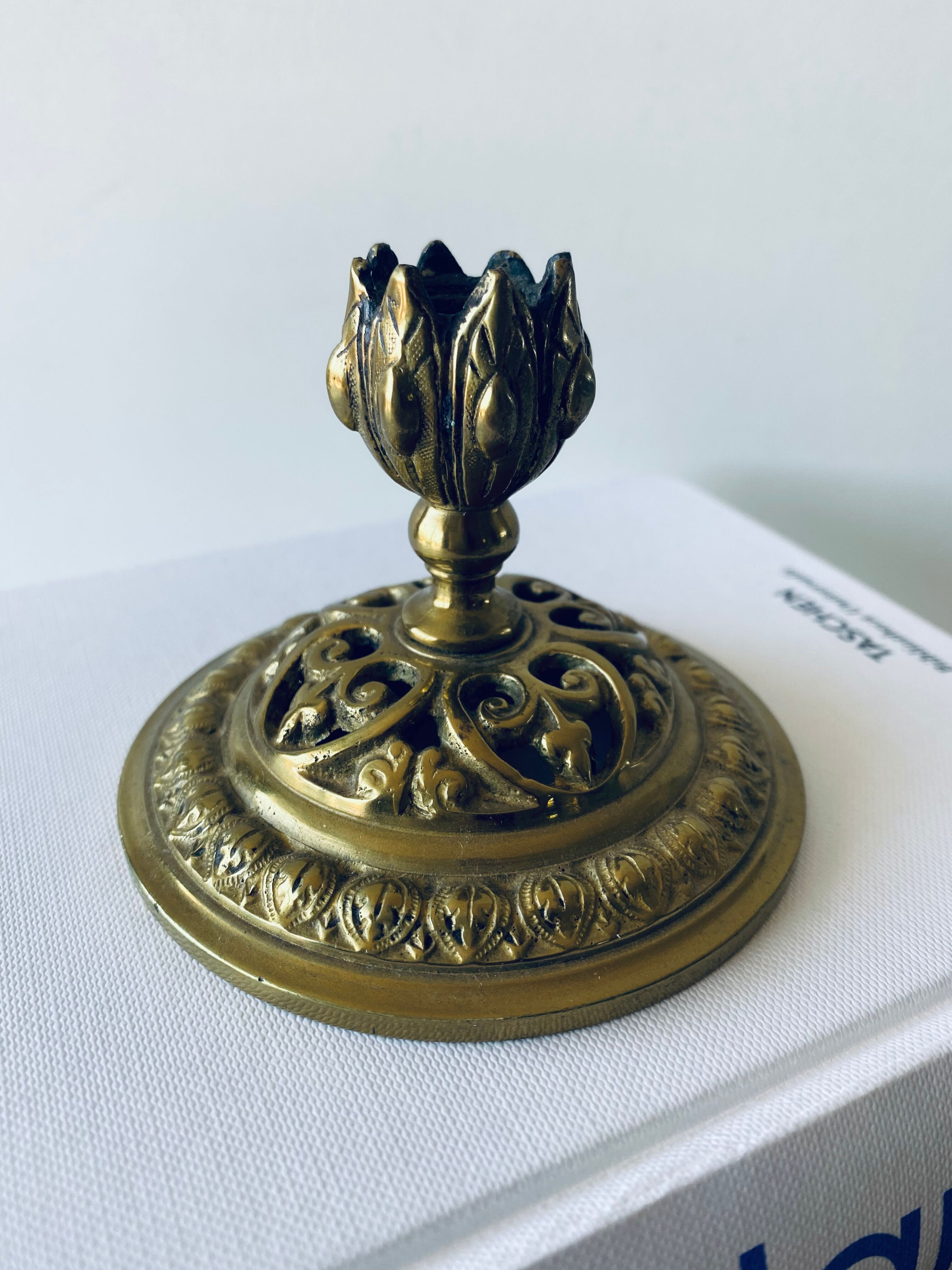 Pair of bronze candle holders signed