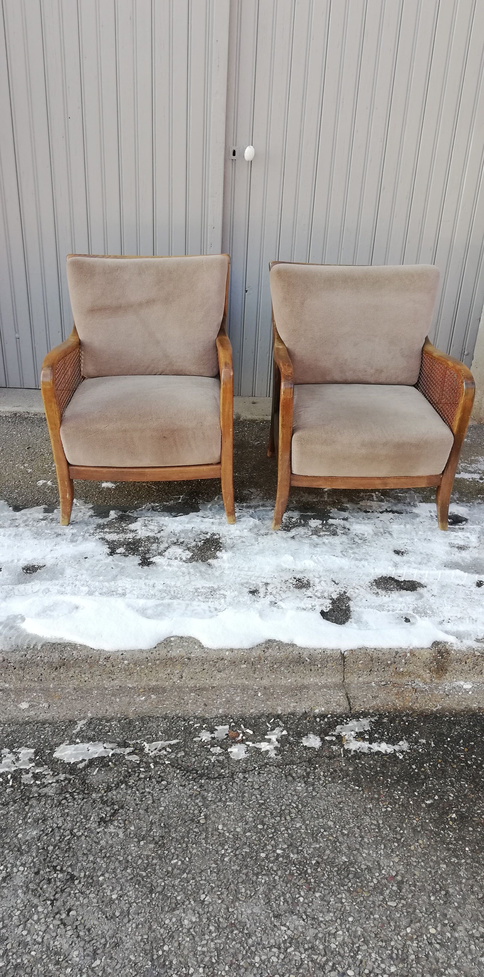 Pair of vintage cannage and fabric armchairs