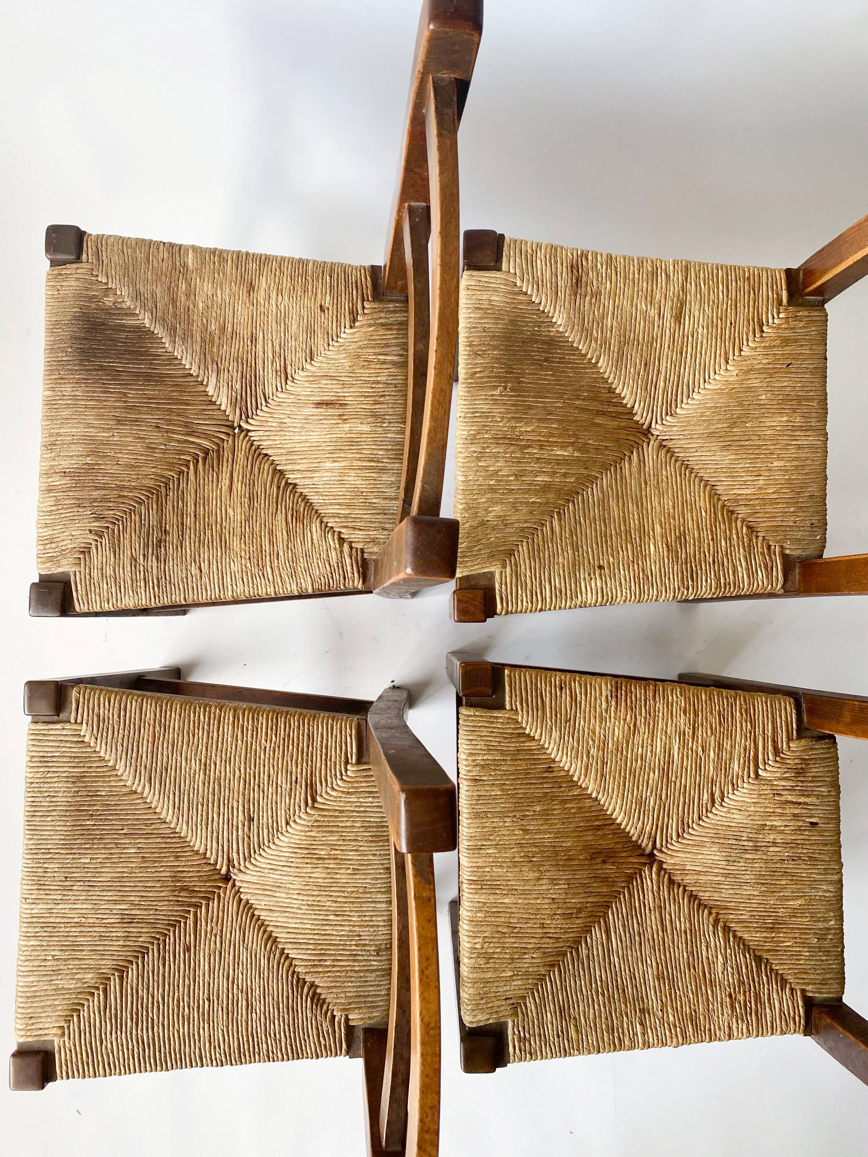 4 wooden and straw country chairs