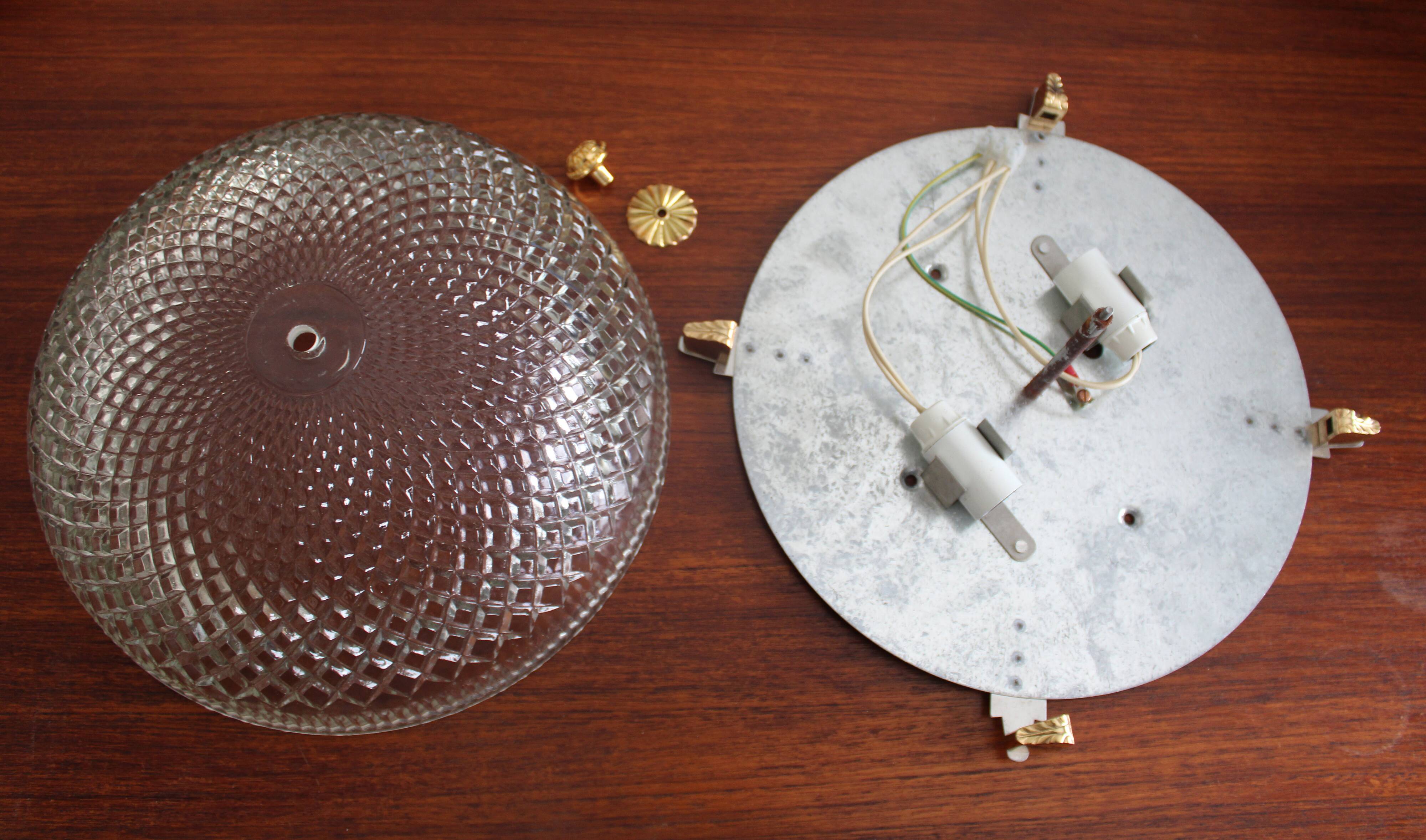 Brass ceiling light with moulded glass