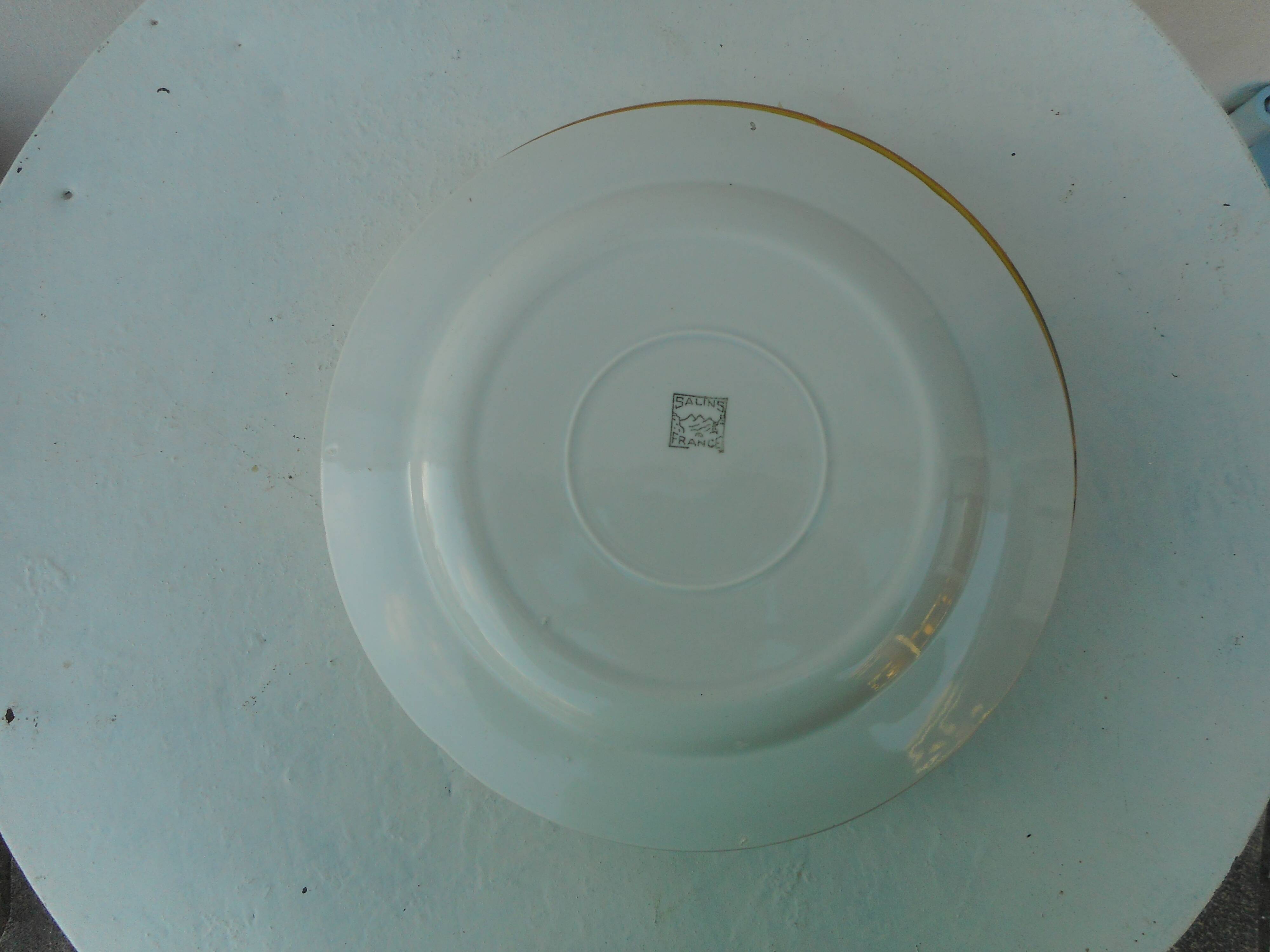 Set of six flat earthenware plates