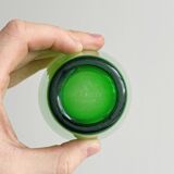 5 translucent green glasses