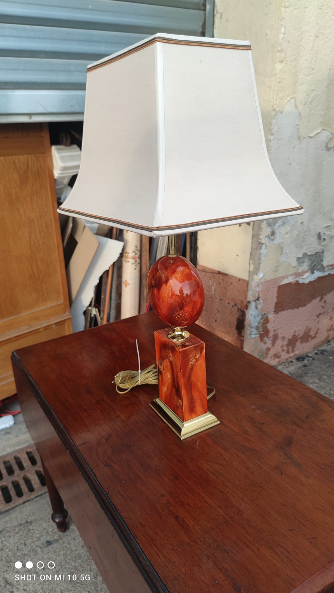Lamp circa 1970 in iron and lacquered wood as well as bronze