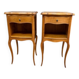 Pair of bedside tables with crossbow base