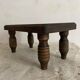 Low stool, turned wooden legs.
