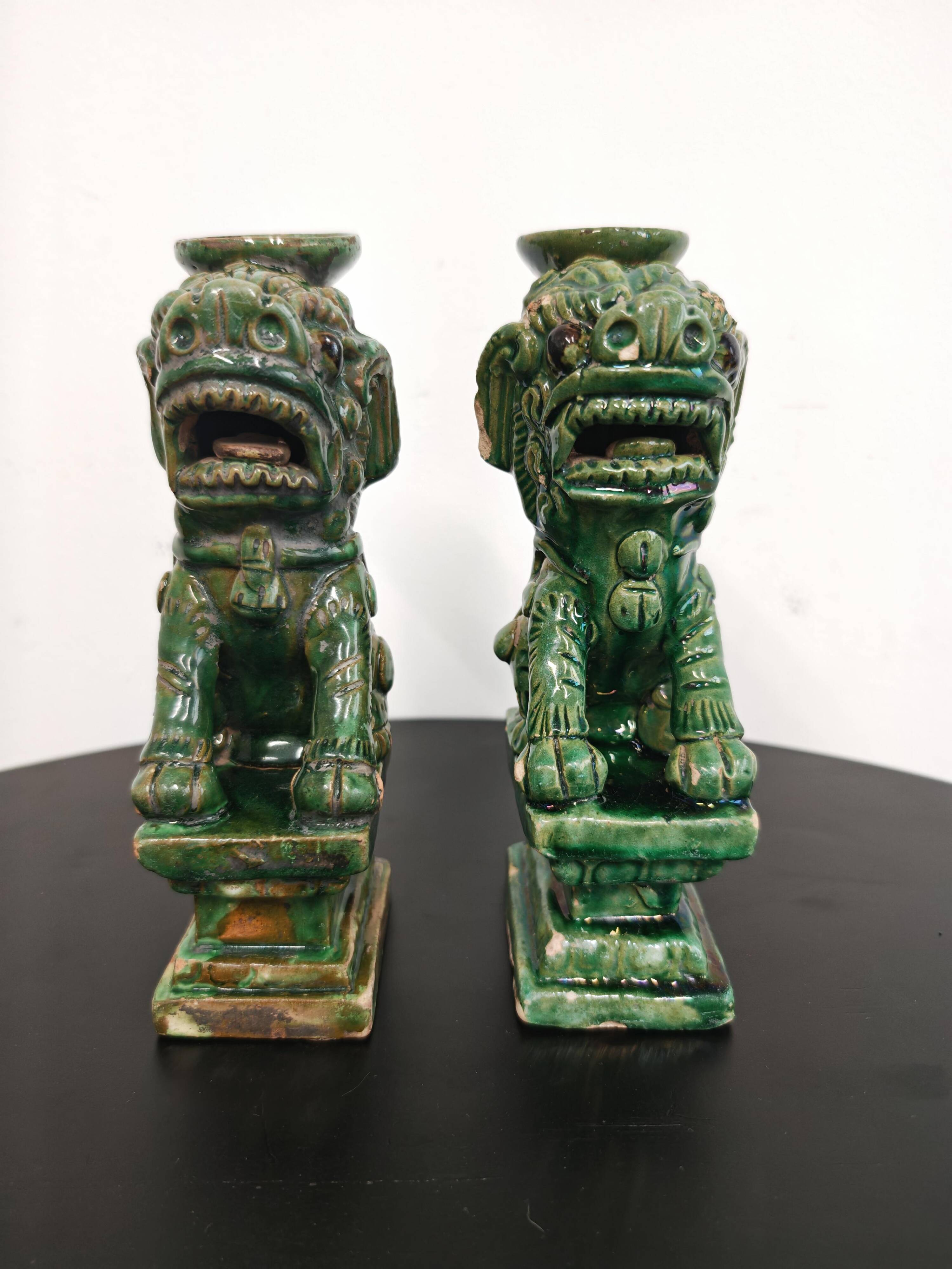 Pair of Foo Dog candle holders in ceramic, China 19th century