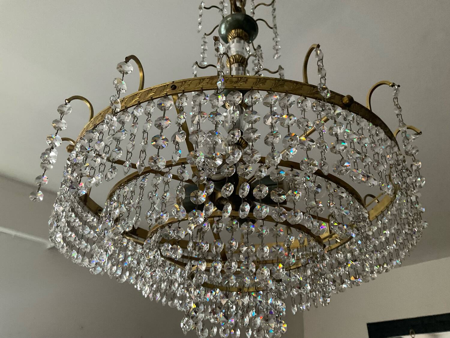 Brass chandelier with crystal pendants