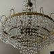 Brass chandelier with crystal pendants