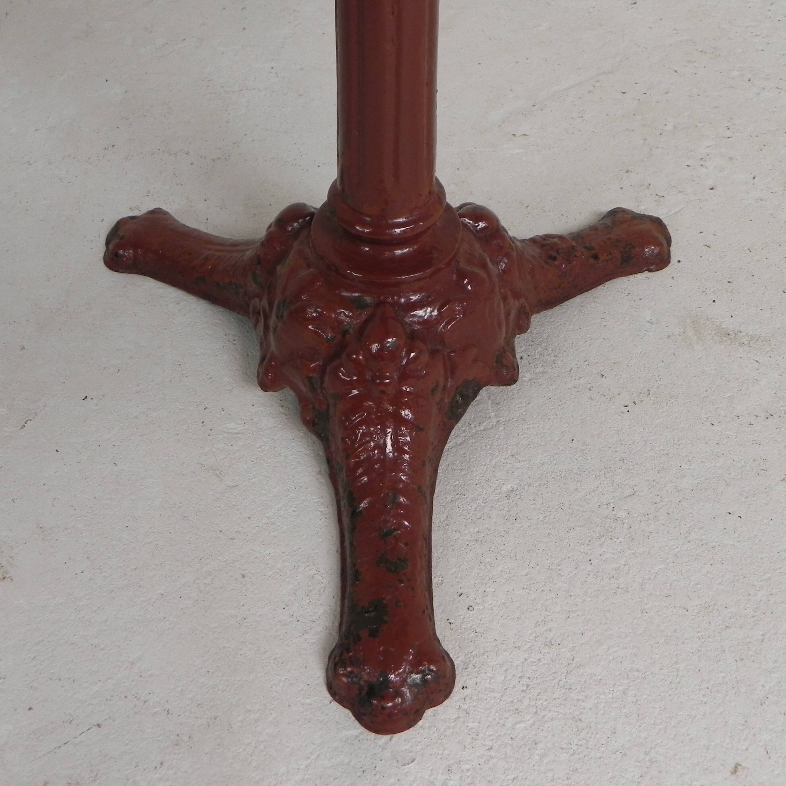 Bistro table with cast iron legs and marble top, 1920s.