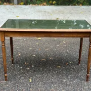 English Regency style coffee table in green leather with gilding and glass from the 1960s.