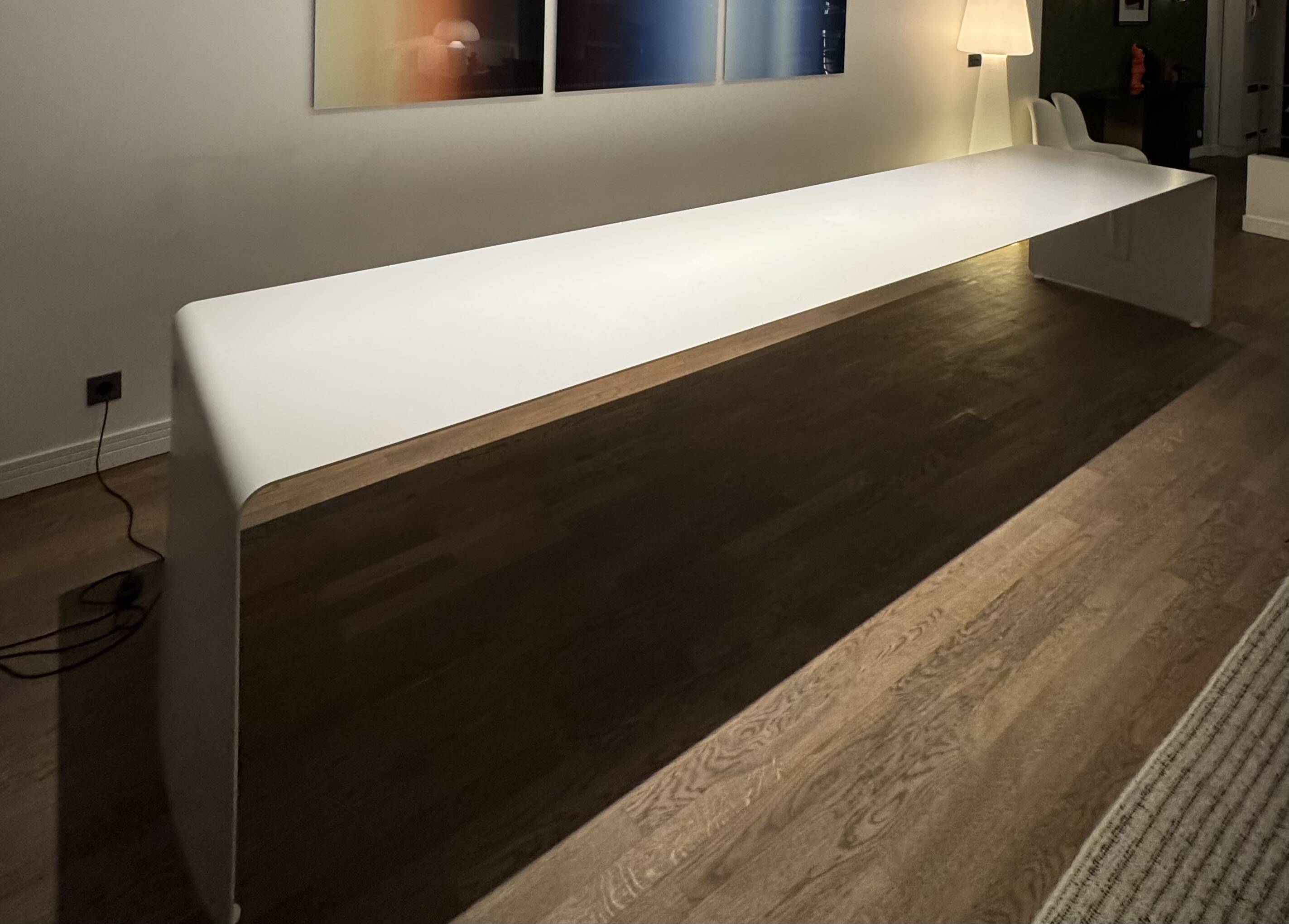 Large curved aluminium tabletop.