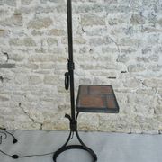 Lampadaire en fer forgé avec tablette en grès décor herbier, années 60