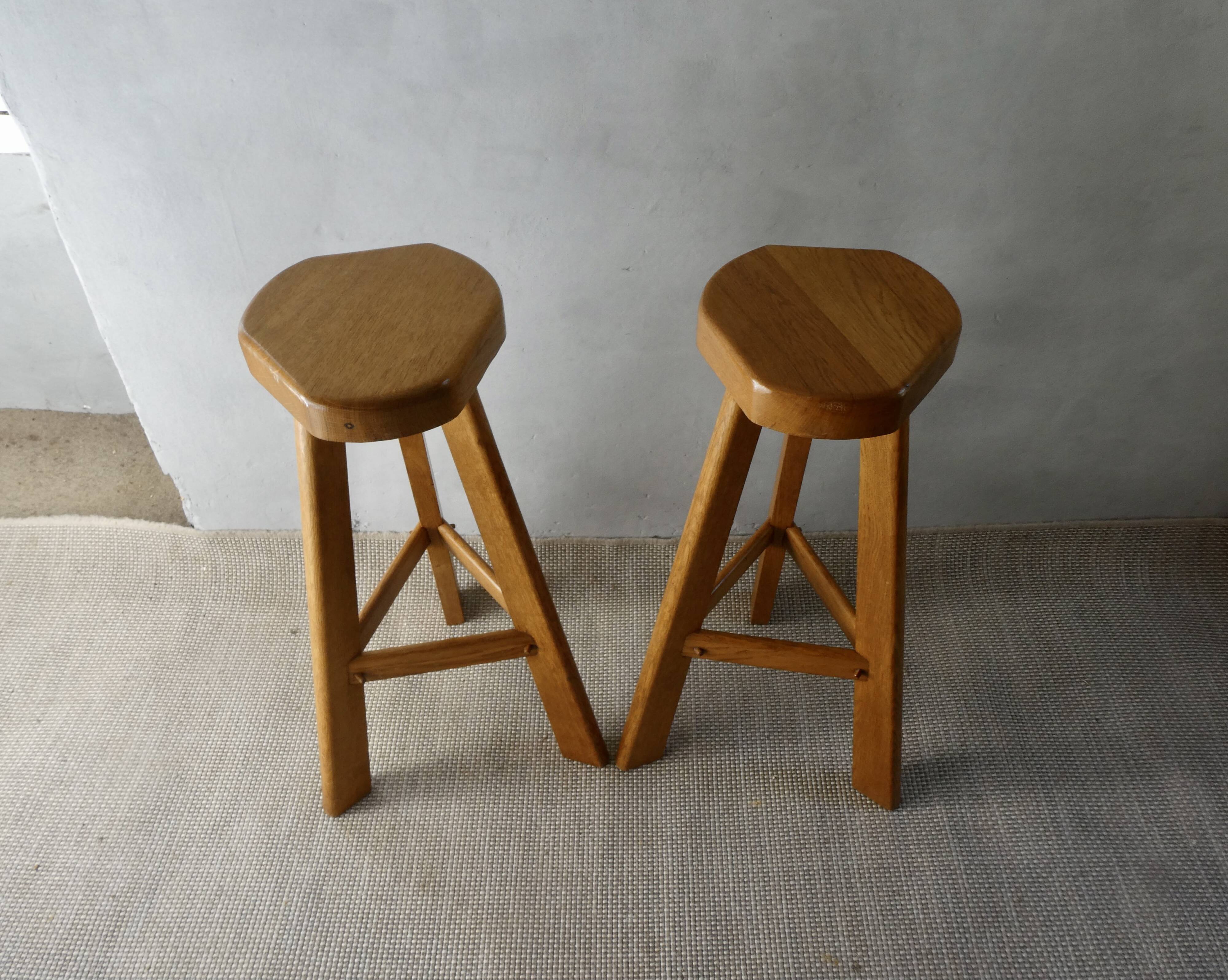 Pair of high bar stools, tripods, in solid wood