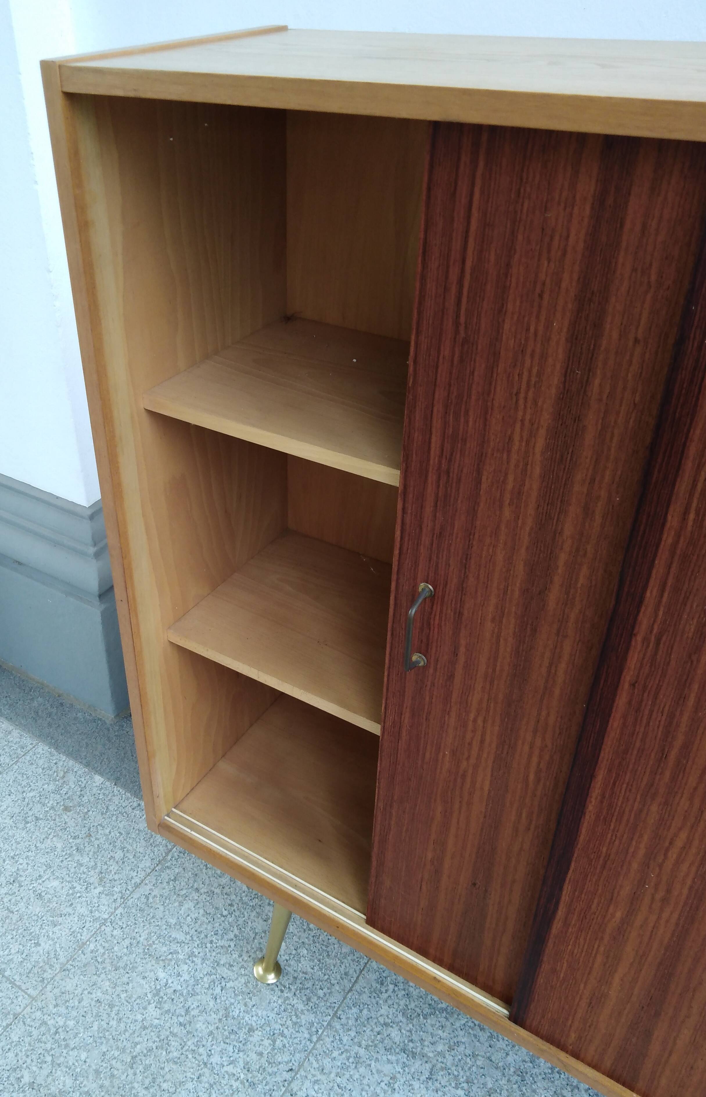 Mid Century cabinet with brass legs