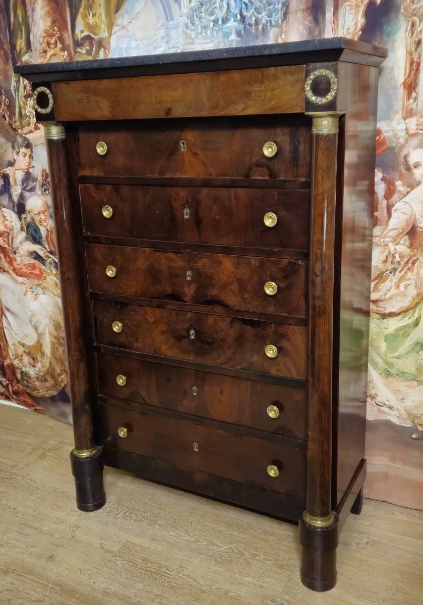 Empire period chest of drawers, early 19th century, in flame mahogany.