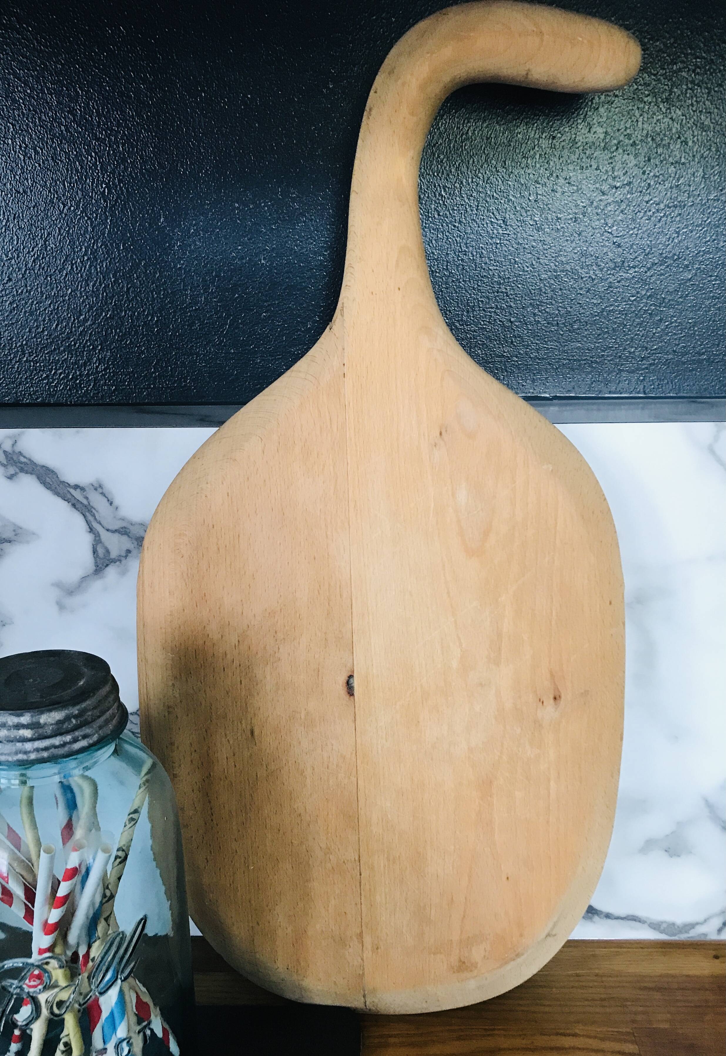 Vintage cutting board with swan neck handle