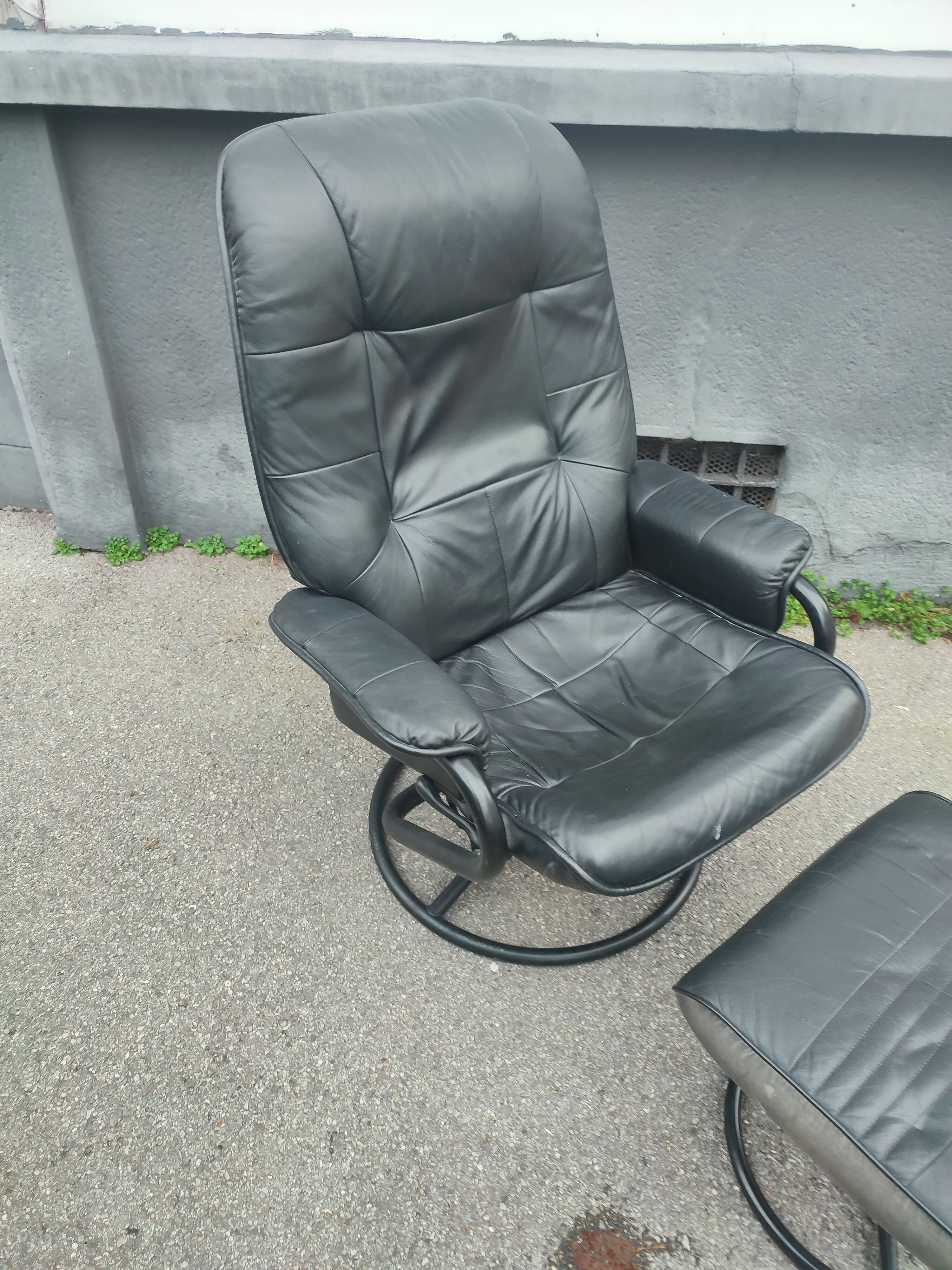 Scandinavian design leather armchair and footrest