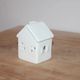 White perforated ceramic house lantern – Light decoration