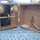 Old instrument box kV 0-25 / R33 porcelain-insulators