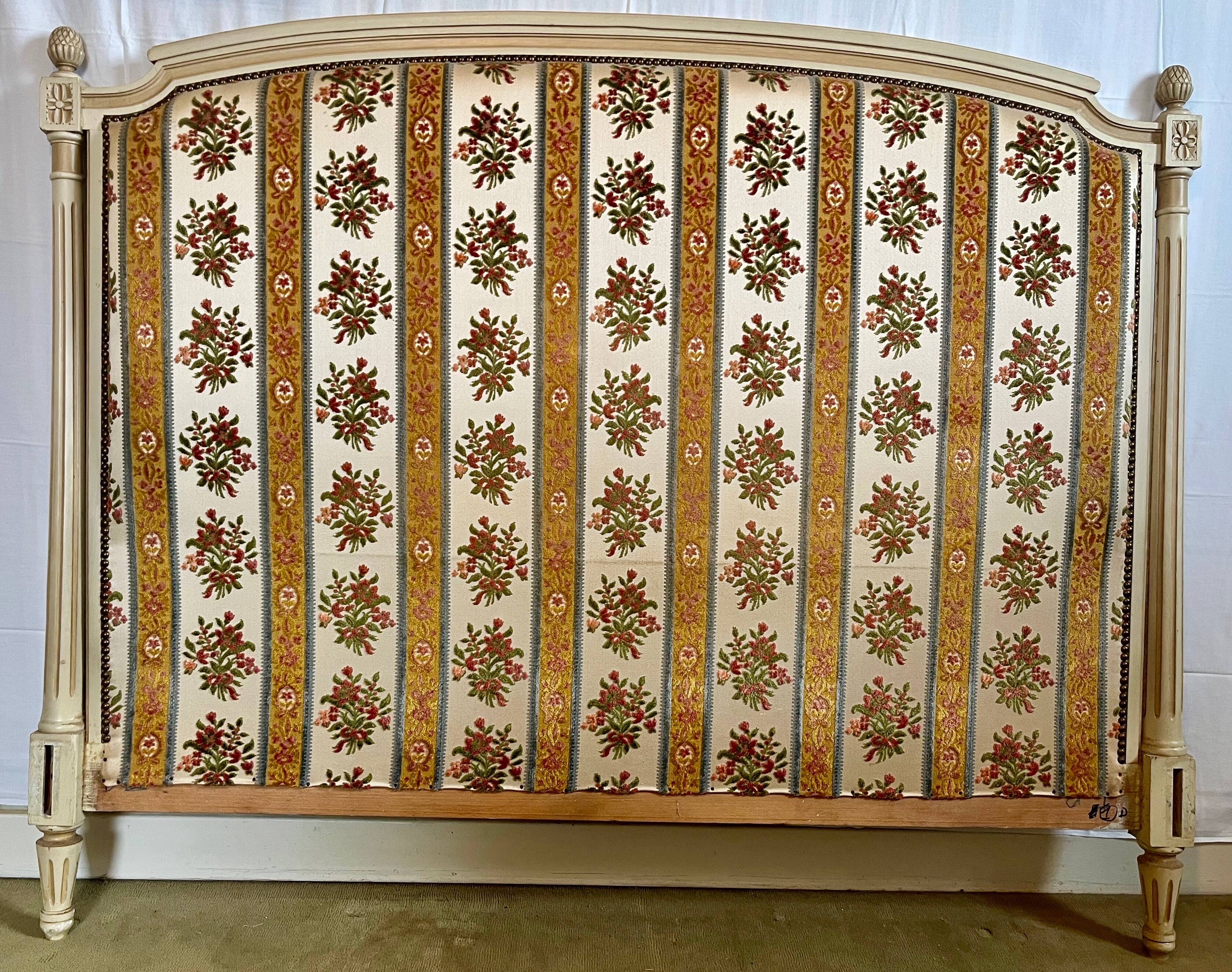 Louis XVI style bed in patinated wood with fluted columns.