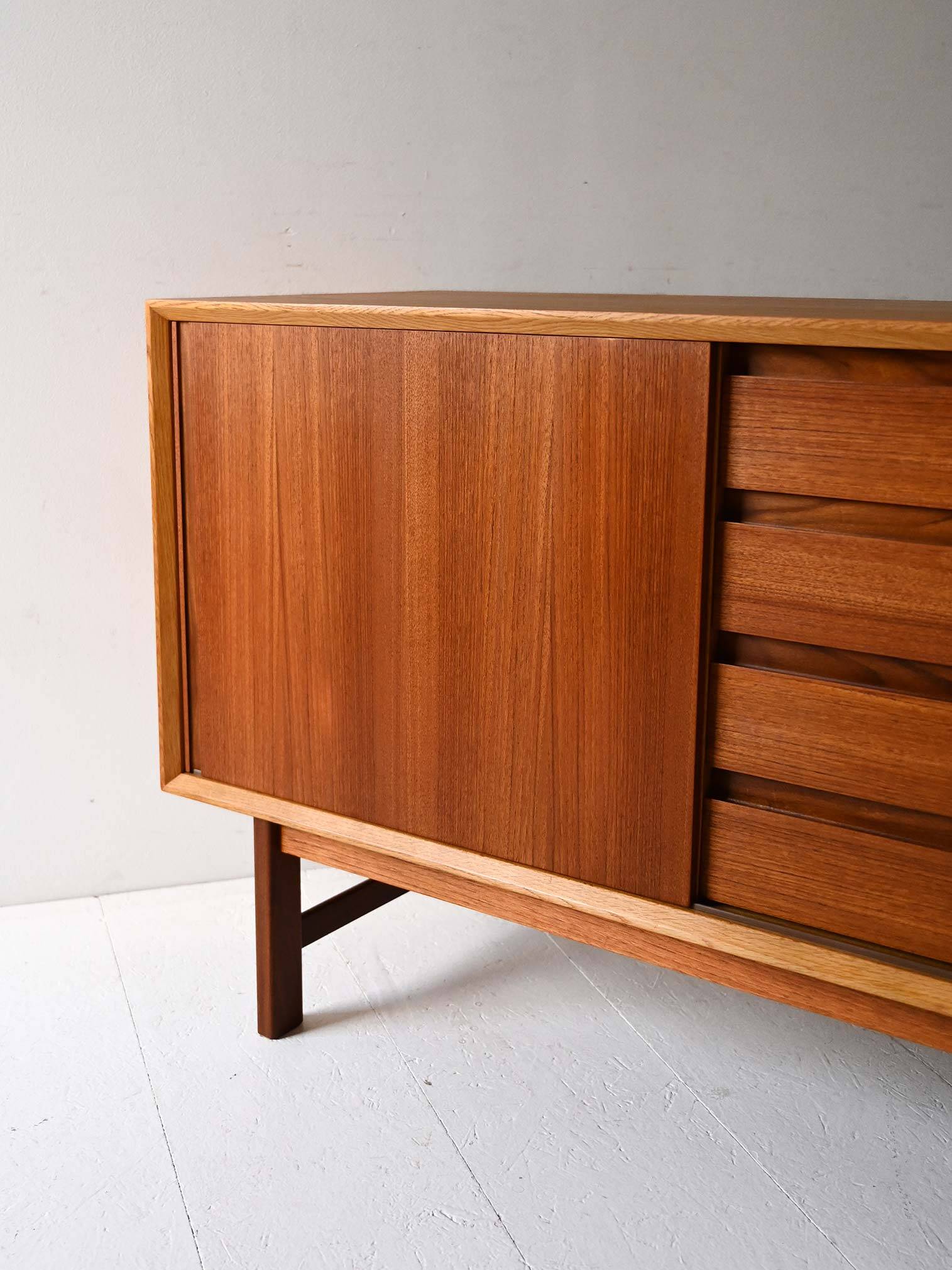 Vintage Scandinavian teak sideboard with metal-lined drawers
