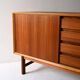 Vintage Scandinavian teak sideboard with metal-lined drawers