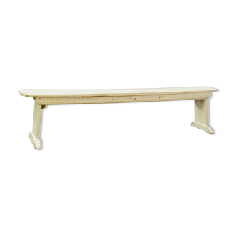 Old wooden bench painted in light green