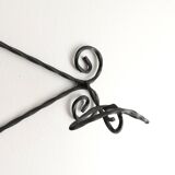 Twisted wrought iron wall coat rack with three hooks